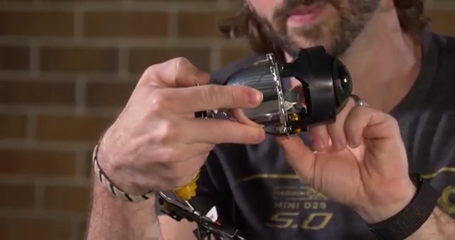 Projector headlight cutoff line showing sharp beam control from properly aligned optics