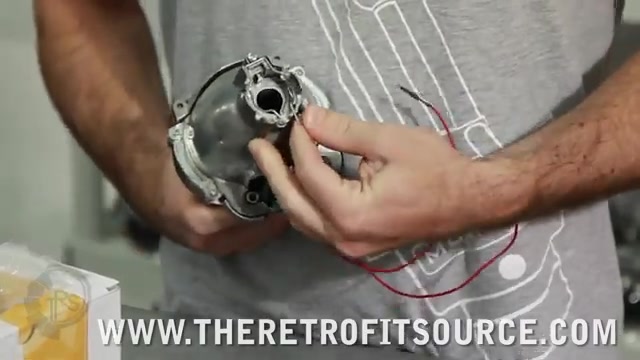 Close-up of projector bulb holder with clips for D2S bulb